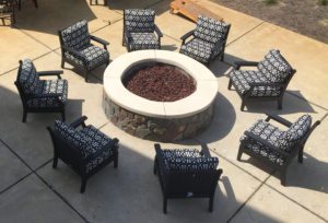 outdoor chairs around a fire pit