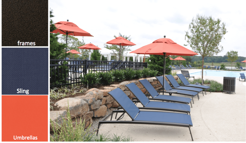 six lounge chairs and a red standing umbrella