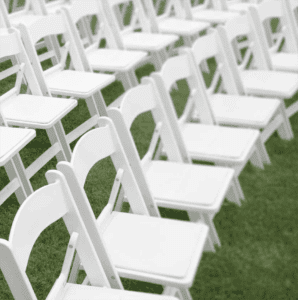 rows of white foldable chairs