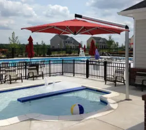 a swimming pool with an umbrella